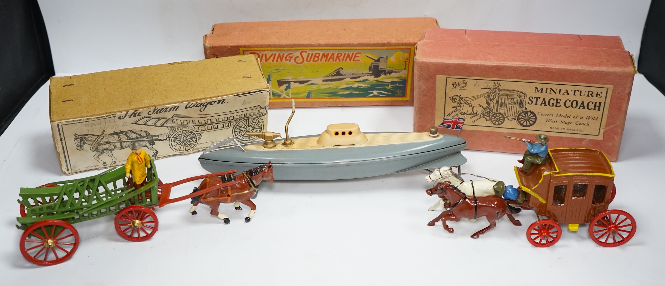 Three boxed 1930s toys; a Johillco Miniature Stage Coach, a Charbens (Set; 503) The Farm Wagon, and a CK, Japan, Diving Submarine in grey-blue finish with Union flag and friction drive motor. Condition - fair to good.